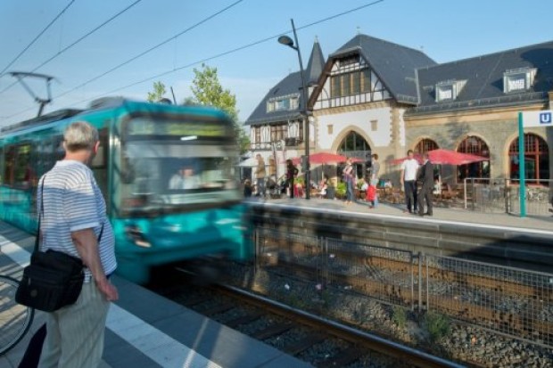 Picture of man standing at train station